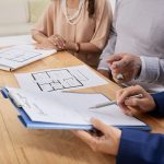 Estate Agent Working with Clients