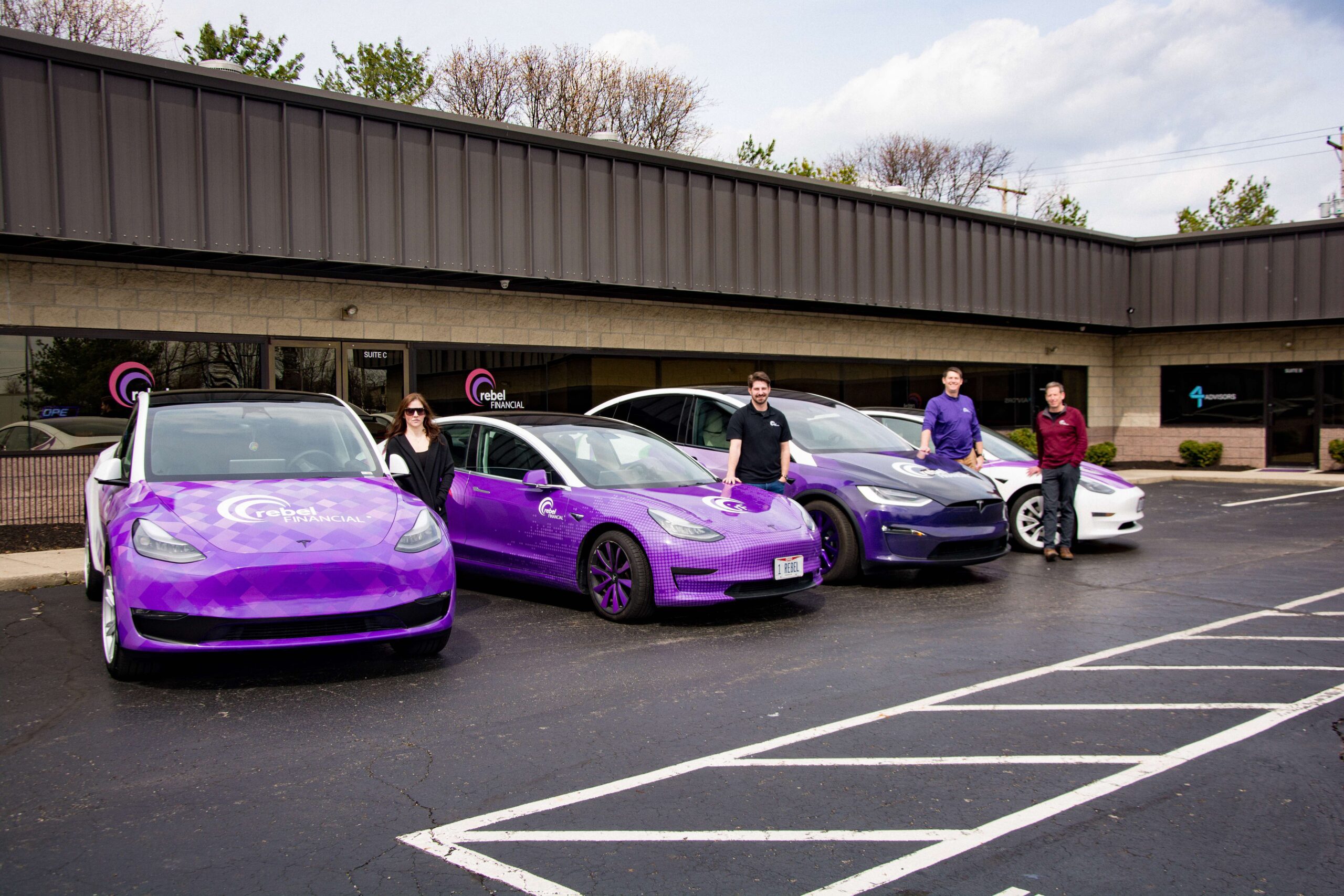 Team Members with Cars
